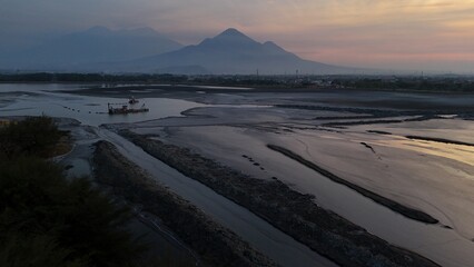 The center of the Sidoarjo hot mudflow or Lapindo mudflow is the result of a mud volcano eruption...