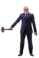 Old businessman holding big hammer isolated on white