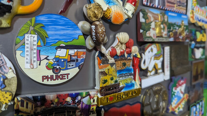 Manila, Philippines - Various refrigerator magnets from different places around Southeast asia. Souvenir novelty items from popular tourist destinations.