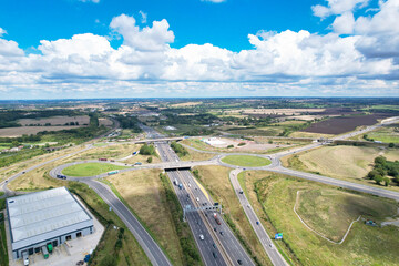 High Angle View of British Motorways and Highways and Traffic on M1 Junction 11a of Luton and...