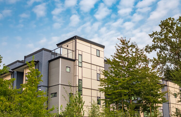 Brand new apartment building on summer. Canadian modern residential architecture. Modern complex of apartment buildings