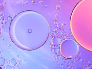 Colorful artistic of oil drop floating on the water. Abstract bubble background.