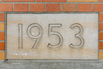1953 gray concrete building cornerstone.
