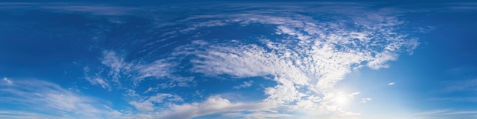 Sunset sky panorama with bright glowing pink Cirrus clouds. Seamless hdr 360 panorama in spherical...