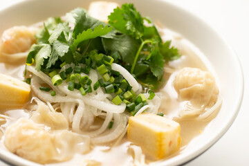 Rice noodles with dumplings