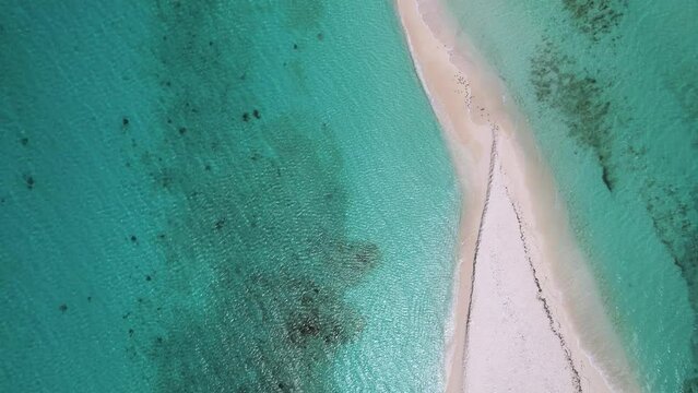Isthmus Cayo De Agua in the Caribbean Sea. Aerial forward, zenithal view