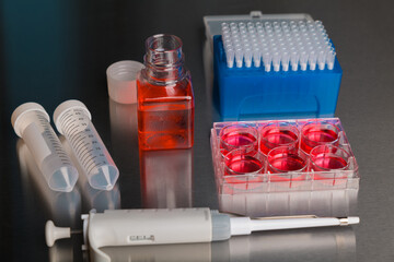Cell culture media in laboratory for pipet.