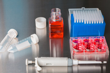Cell culture media in laboratory for pipet.