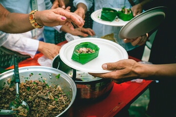 Volunteer concept to donate ready-to-eat food to the hungry and poor