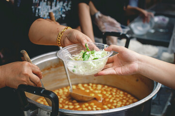 Volunteer concept to donate ready-to-eat food to the hungry and poor