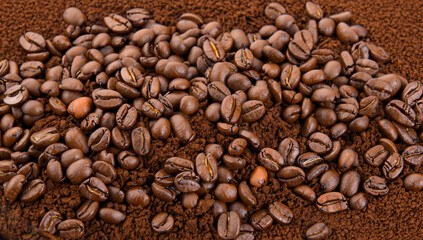 Coffee beans background. Roasted coffee beans close up