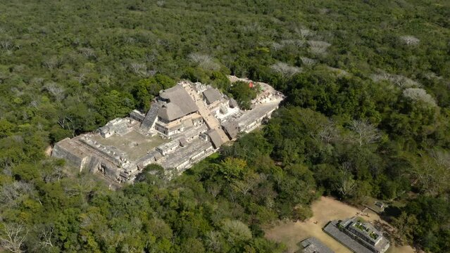 Ancient Maya city of Ek Balam with stone pyramid in mexican jungle.