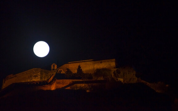 Moon over the castle in the moonlight