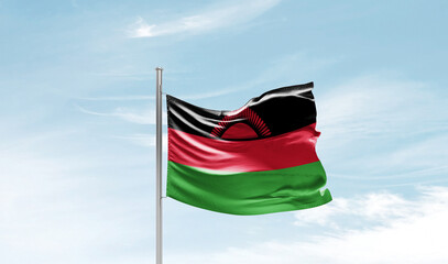 Malawi national flag waving in beautiful sky. The symbol of the state on wavy silk fabric.