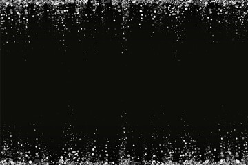 Abstract festive background, silver sparkles on a black background.