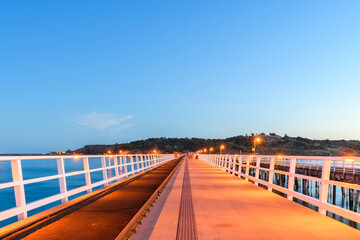 Victor Harbor to Granite Island new causeway viewed from the mainland at dusk, Fleurieu Peninsula, South Australia
