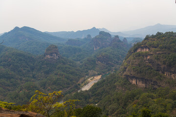 Fototapeta na wymiar Wuyishan mountains in Fujian Province, China. Scenic view over the peaks of Wuyi