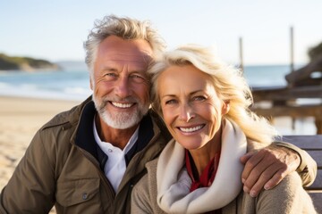 Obraz premium Portrait of a smiling middle-aged couple outdoors