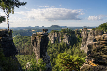 Fototapeta na wymiar View of the Bastei and rock formations in the Elbe River Valley, Saxon Switzerland National Park, Germany