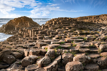 Close up view to stone formations at Giants Causeway in evening, Northern Ireland.