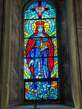 Zloty Potok, Poland, July 30, 2023: Interior of the church of St. John the Baptist in Zloty Potok, Poland. Stained glass window depicting st. Queen Jadwiga