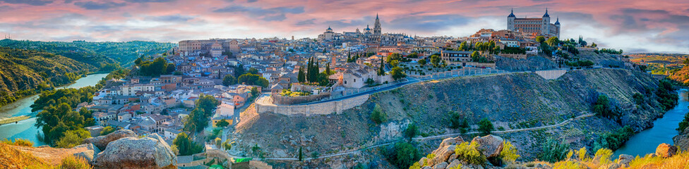 Obraz premium Travel Concepts. Picturesque Panoramic View of Medieval Center of Toledo City in Spain With Tejo River, Cathedral and AlcÃzar of Toledo.