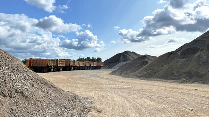 Asphalt concrete mixes or materials. Pile of gravel, crushed stone, sand and building material for...