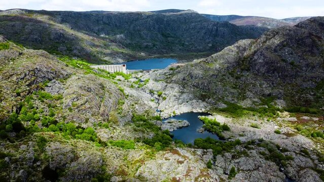 Tera river canyon, dam, lake, incredible shadows and light cast from sun and clouds, aerial