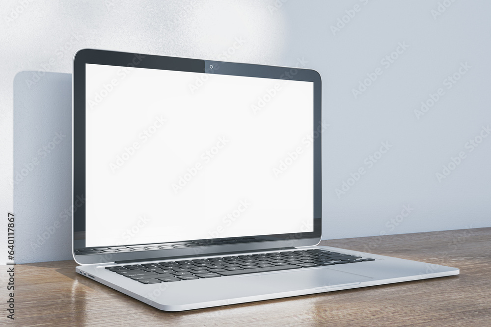 Aufkleber Close up of notebook with empty white mock up screen placed on wooden desk. Concrete wall with shadows in the background. 3D Rendering.