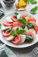 Caprese salad with tomatoes, mozzarella and basil.