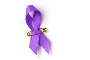 Violet ribbon with safety pin on white background - Concept of Domestic Violence awareness; Alzheimer's disease, Pancreatic cancer, Epilepsy awareness and Hodgkin's Lymphoma