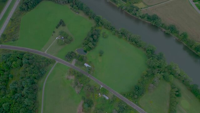 Nineveh, New York on the sides of the Susquehanna river. Drone aerial of the farms and historic home of Joseph Knight Sr.  And Mormon early history