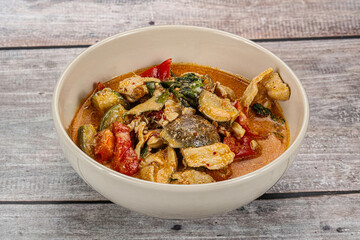 Thai red spicy curry with chicken