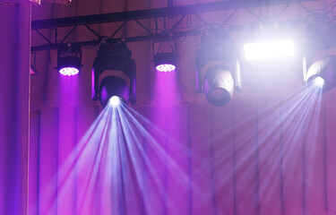 scene, stage light with colored spotlights and smoke