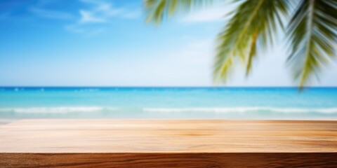 Wooden board on tropical beach. Sand and blue sky with palm leaf. Summer rest background with copy space