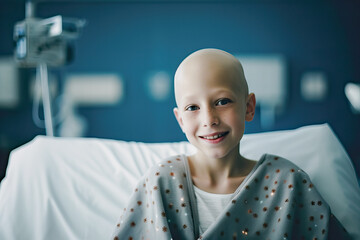 A young boy bravely battling cancer in a hospital bed