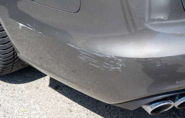 Paint scratches on a bumper of the car