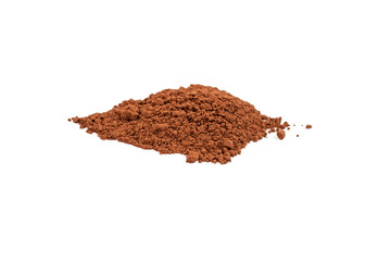 Leaf shaped cocoa powder pile, close up isolated on white background.