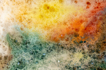 Fototapeta premium Multicolored foam rainbow bubbles, abstract soft focus close up texture