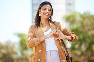 Portrait, city and woman with heart sign, business and travel with support, emoji and kindness....