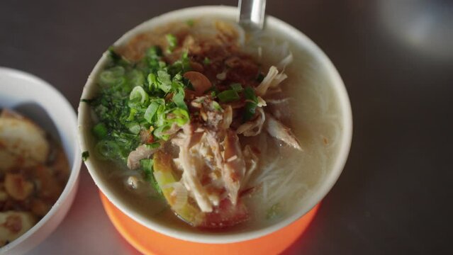 Close Up Soto Mie a spicy Indonesian noodle soup Bihun dish commonly found in Indonesia, Malaysia, and Singapore