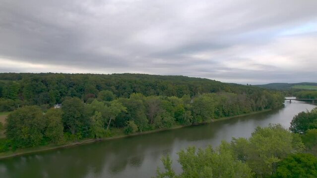 Drone reveal aerial of the Susquehanna in Nineveh and Afton NEW York. Bridge.