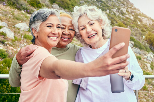 Nature, fitness or selfie of senior friends on social media together for outdoor exercise in retirement. Photo, diversity or happy elderly women hiking to take pictures on break in training in park