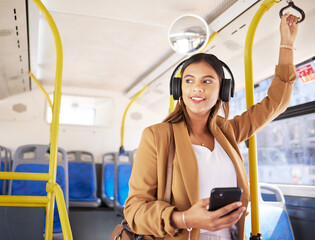 Bus, woman and phone with headphones on public transport, music and smile with business commute....