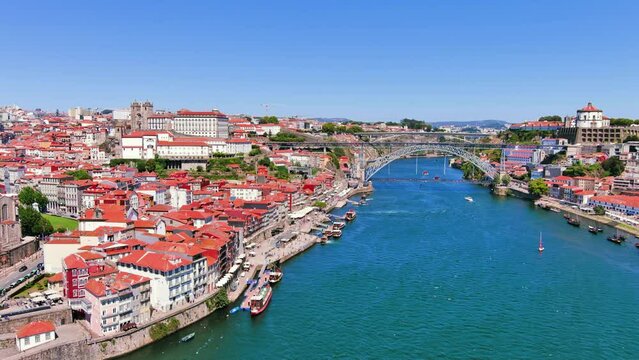 Porto, Portugal: Aerial view of famous historic European city, center with iconic Lu&iacute;s I Bridge (Ponte Lu&iacute;s I) over Douro river, Ribeira district - landscape panorama of Southern Europe from above