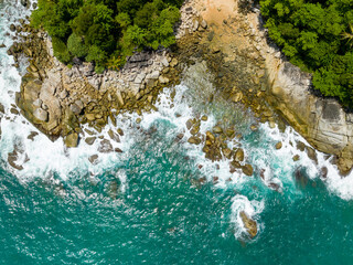 Aerial view seashore with mountains at Phuket Thailand, Beautiful seacoast view at open sea in summer season, Nature recovered Environment and Travel background