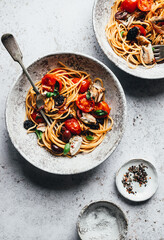pasta with fried pan tomato and basil