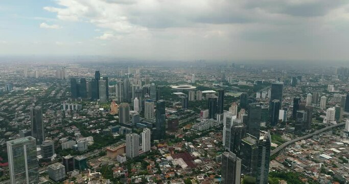 Jakarta business district in Indonesia capital city with many modern skyscrapers. Indonesia.
