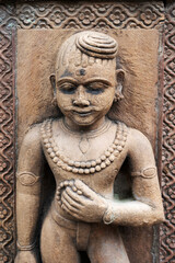Fototapeta na wymiar Carved idol on the outer wall of the Krishnapura Chhatris, also known as the Krishna Pura Chhatris, built in the mid 19th century, Indore, Madhya Pradesh, India