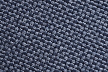 Macro photo of blue textured fabric as background